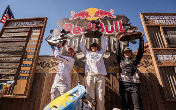 Red Bull Rampage women's first place winner, New Zealander Robin Goomes (C), is flanked by American Hannah Bergemann (L) and Canadian Kirsten Van Horne (R).