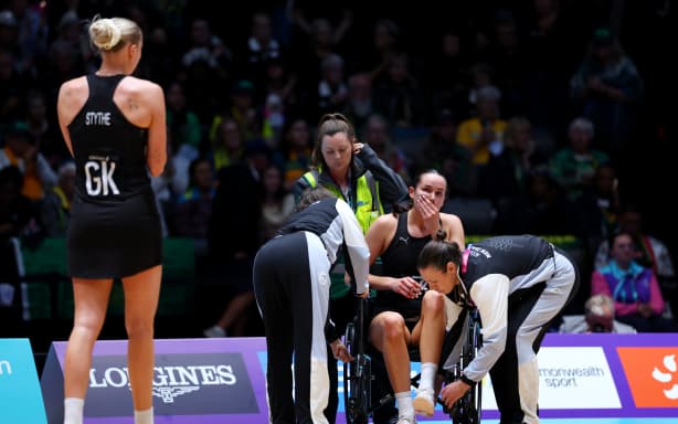 GLASGOW, SCOTLAND - JULY 29: Catherine Hall of Team New Zealand receives medical treatment on the court after an injury during the Preliminary Round Pool match between Team New Zealand and Team Wales on day six of the Glasgow 2026 Commonwealth Games at The Hydro on July 29, 2026 in Glasgow, Scotland. (Photo by Molly Darlington/Getty Images)