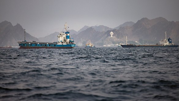 Oil tankers and cargo vessels anchored off Port Sultan Qaboos in Muscat, Oman, in late June.