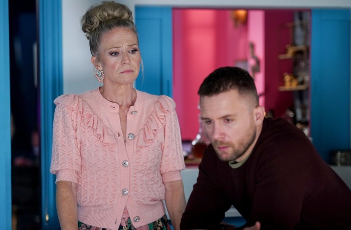 576765,TITLE:Eastenders Linda stands over Lee in a scene from EastEnders