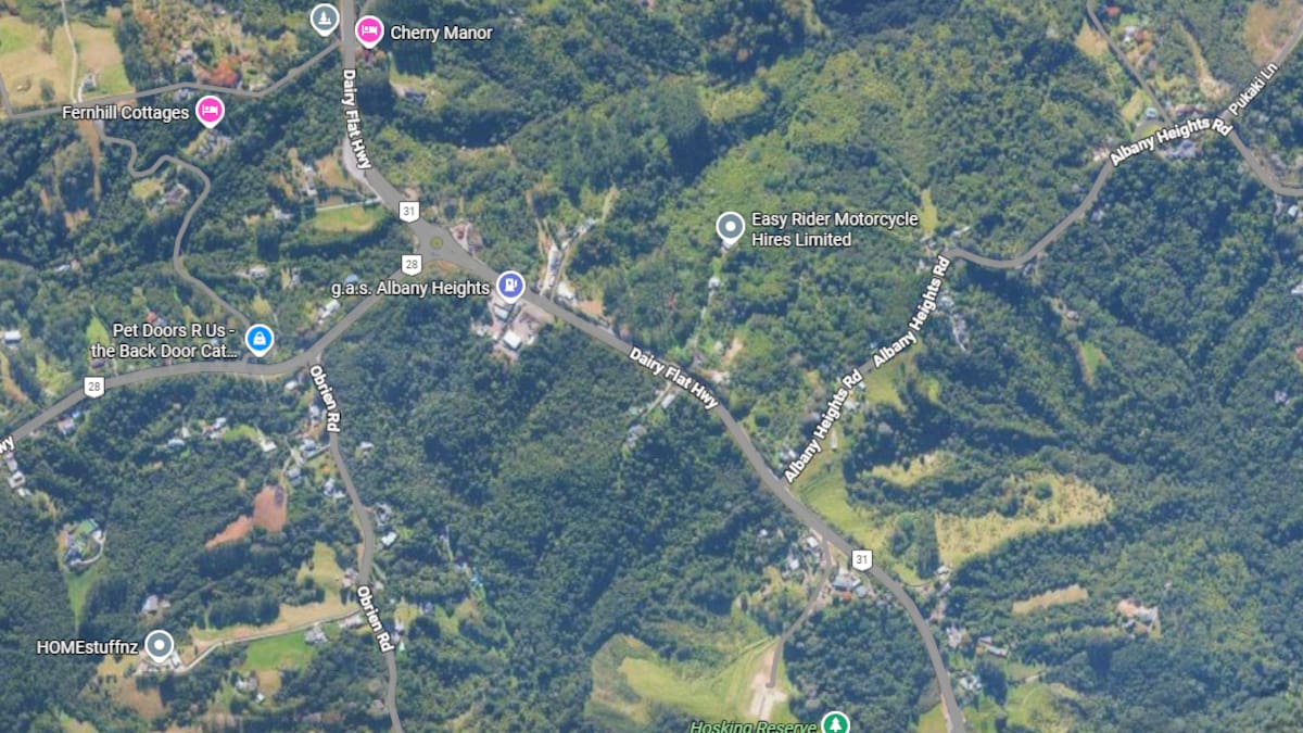 Car crashes into house being transported early morning on Dairy Flat Highway, Auckland, two seriously injured after being trapped