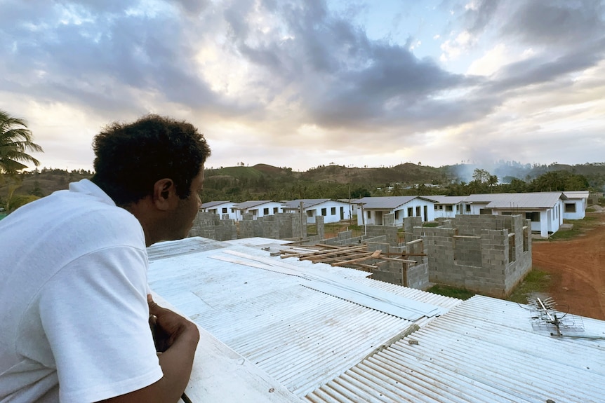 Sami-is-looking-over-the-roofs-of-the-new-buildings