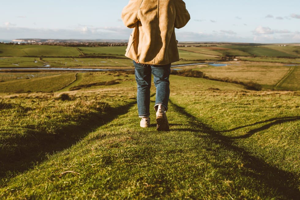 young woman hiking on seven sisters cliffs