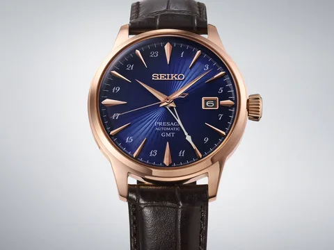 seiko presage watch with blue dial, gold tone case, and black leather strap. seiko presage watch with blue dial, gold tone case, and black leather strap.