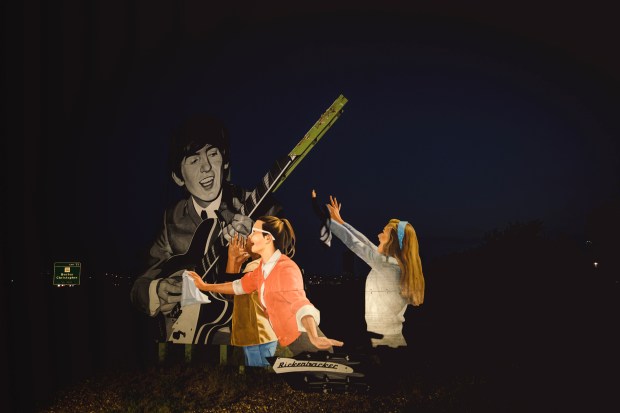 Display near the I-57 exit into Benton depicting George Harrison's time in the downstate town, June 3, 2026. (E. Jason Wambsgans/Chicago Tribune)