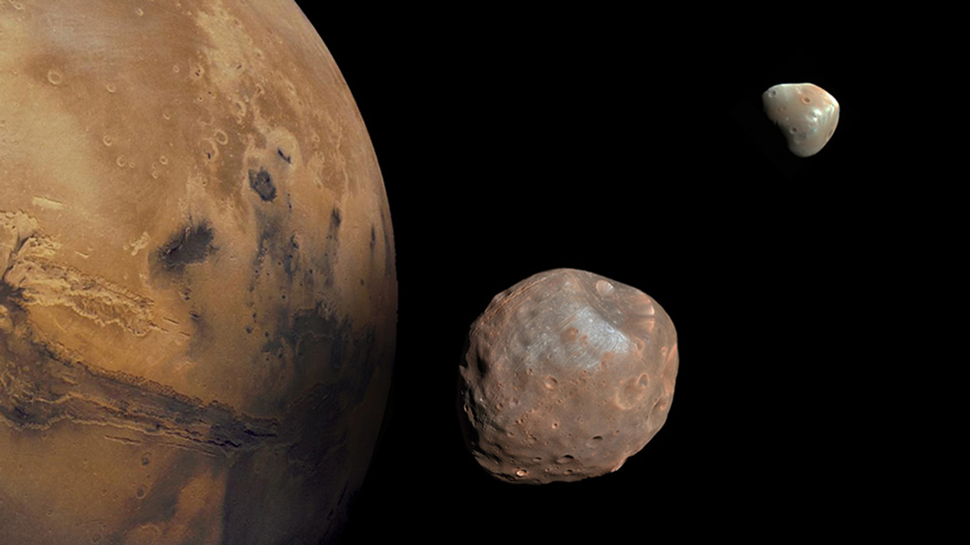 Mars and its two moons, Phobos and Deimos.
