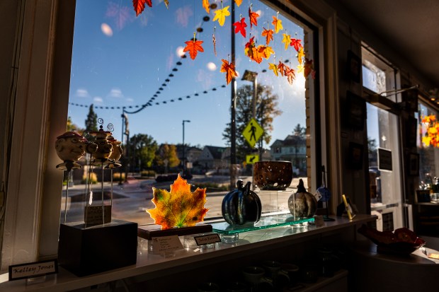 Art by member artists is displayed in the front window at Madison and Main Gallery in Greeley on Friday, Oct. 16, 2026. (Brice Tucker/Staff Photographer)