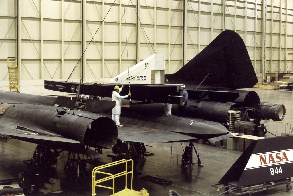 LASRE Pod Matting to SR-71, USA, 1996. View of the Linear Aerospike SR Experiment (LASRE) pod on NASA SR-71, tail number 844. This photo was taken during the fit-check of the pod on Feb. 15, 1996, at Lockheed Martin Skunkworks in Palmdale, California. The LASRE experiment was designed to provide in-flight data to help Lockheed Martin evaluate the aerodynamic characteristics and the handling of the SR-71 linear aerospike experiment configuration. The goal of the project was to provide in-flight data to help Lockheed Martin validate the computational predictive tools it was using to determine the aerodynamic performance of a future reusable launch vehicle. The joint NASA, Rocketdyne (now part of Boeing), and Lockheed Martin Linear Aerospike SR-71 Experiment (LASRE) completed seven initial research flights at Dryden Flight Research Center. Artist NASA. (Photo by Heritage Space/Heritage Images via Getty Images)