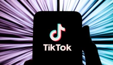 A smartphone displays the TikTok logo.