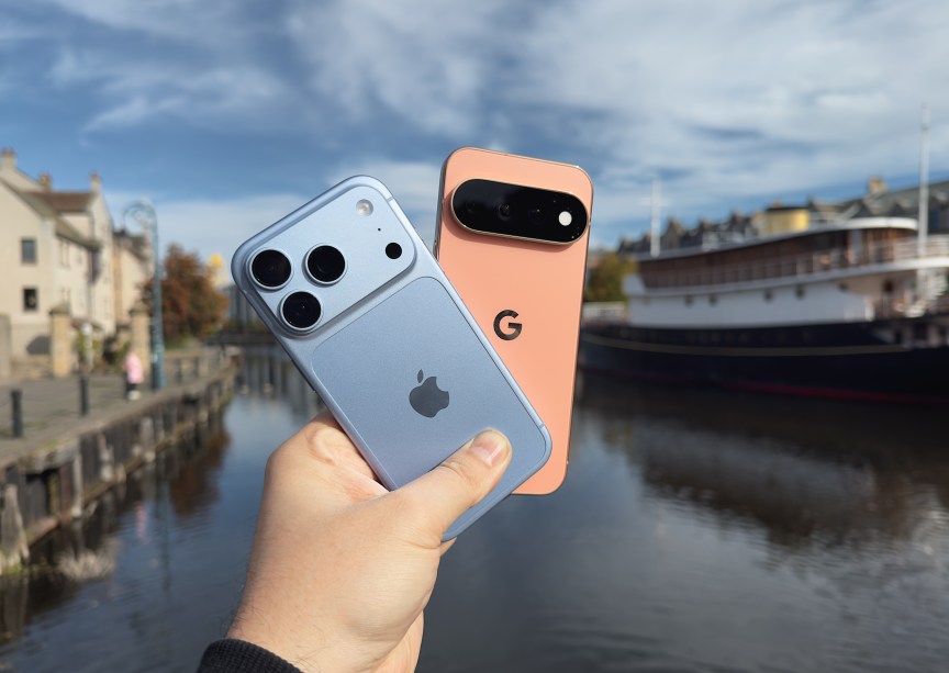 Image showing two phones being held in a hand