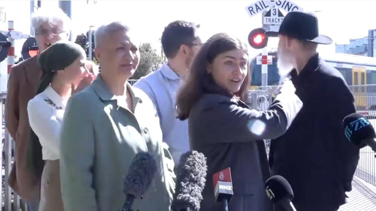 Driver fined after near-miss during Green Party train level crossings announcement