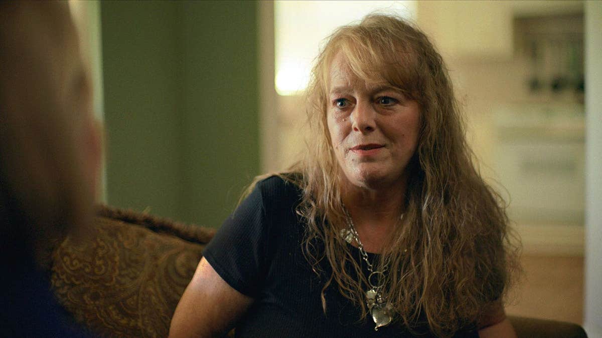 Leslie Pickett wears a black shirt as she's interviewed by Mariana van Zeller.