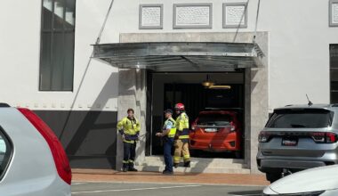 Tauranga crash: Car mounts footpath and crashes through Priority One entrance