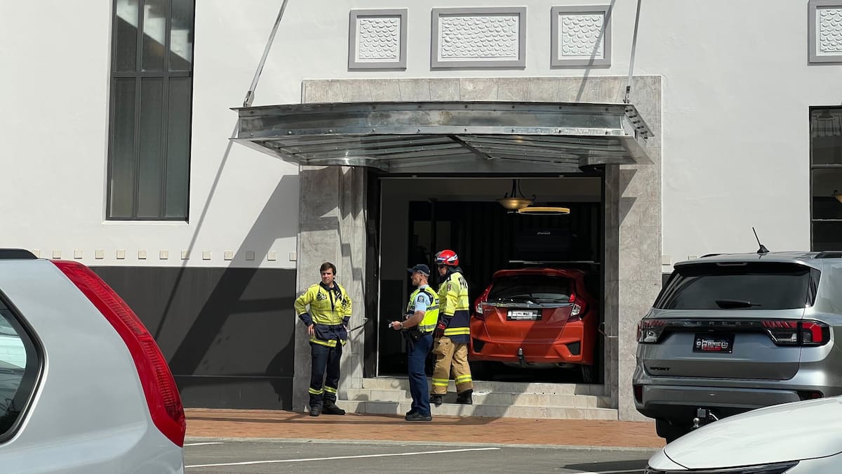 Tauranga crash: Car mounts footpath and crashes through Priority One entrance
