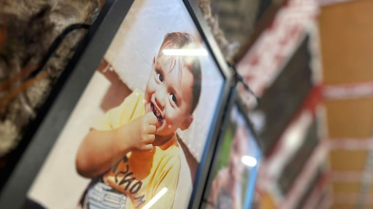 A photo of baby Ru on a wall.