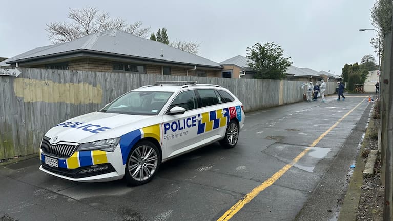 A police car at the scene on Olliviers Rd in Phillipstown.