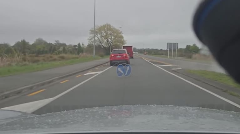 A sign was sent spinning across the road following the incident. 