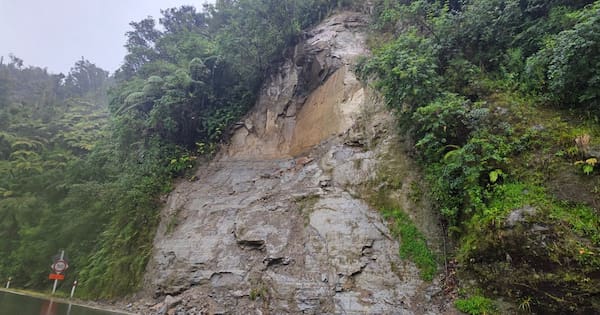 Slip, surface flooding as heavy downpours move across NZ