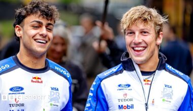 Racing Bulls drivers Arvid Lindblad and Liam Lawson while walking through the paddock at the 2026 Belgian Grand Prix