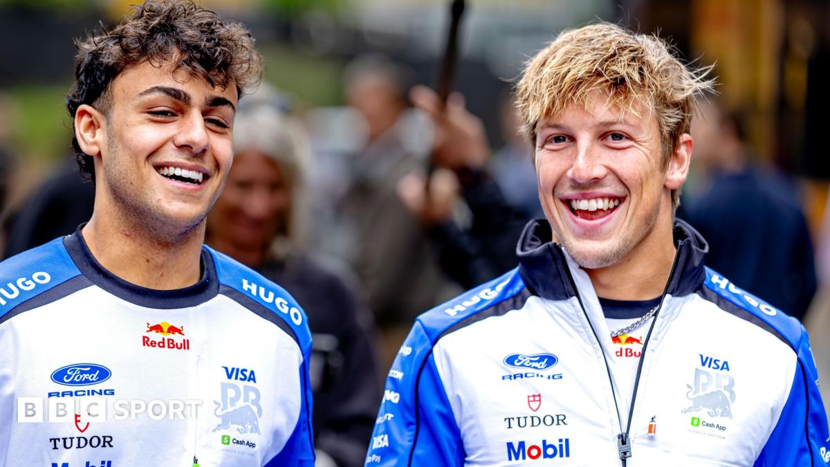 Racing Bulls drivers Arvid Lindblad and Liam Lawson while walking through the paddock at the 2026 Belgian Grand Prix