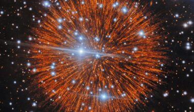 A glowing ball with orange streaks is seen in deep space