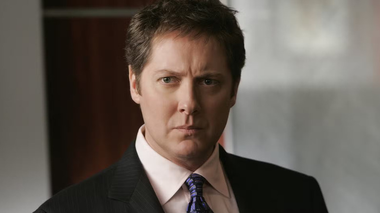 James Spader as Alan Shore, frowning in Boston Legal.