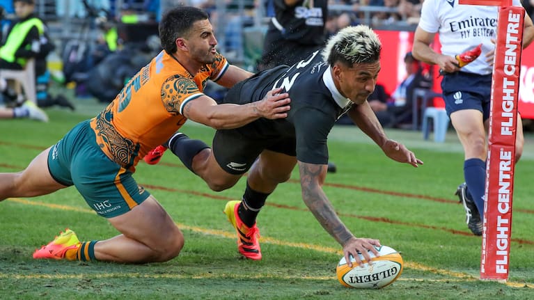 All Black Rieko Ioane scores a try against the Wallabies in Sydney.