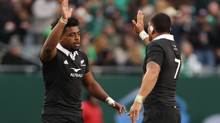 All Blacks loose forwards Peter Lakai, left, and Ardie Savea celebrate a moment during their team's win over Ireland in Chicago last year.