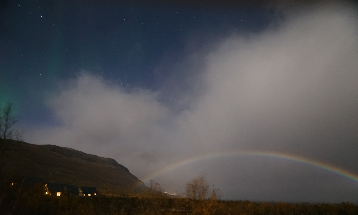 Aurora borealis, the Northern Lights, and a moonbow. Credit: Chad Blakely / Lights Over Lapland
