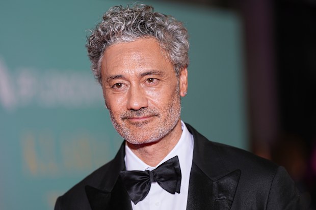 Director Taika Waititi poses for photographers upon arrival at the premiere for the film “Klara and the Sun” as part of the London film festival in London