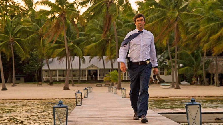 Kyle Chandler as John Rayburn, walking down a dock in Bloodline.