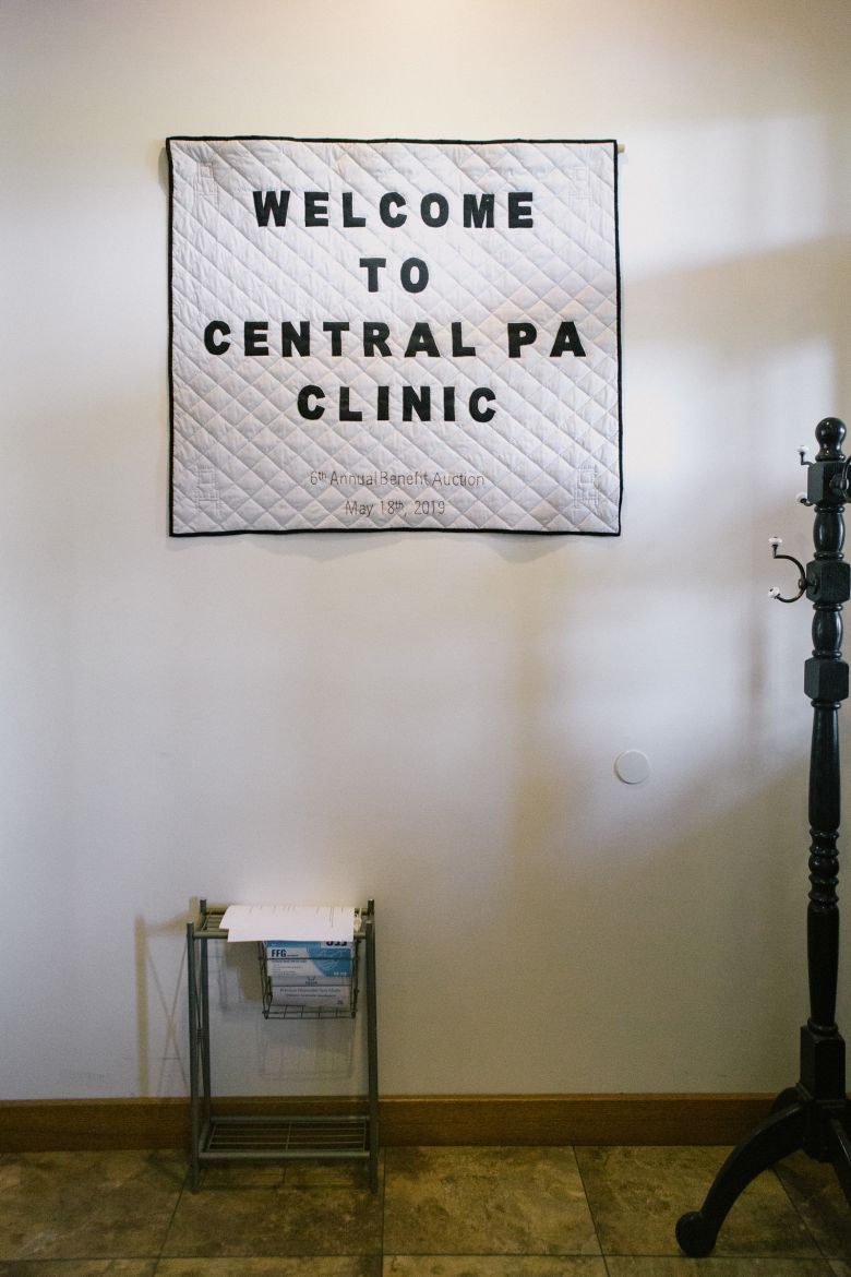 A handmade quilt adorns the clinic's vestibule.