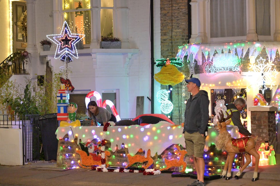 christmas lights and decorations on a house during amandaland christmas special filming