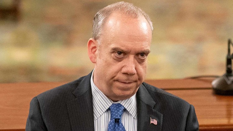 Paul Giamatti as Chuck Rhoades, scowling in court in Billions.