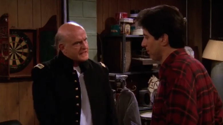Peter Boyle as Frank Barone yells at Ray Romano as Ray Barone on Everybody Loves Raymond