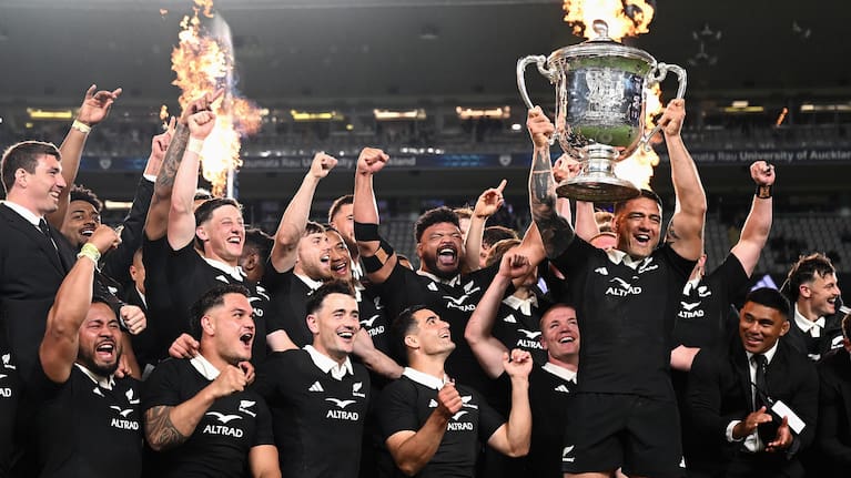 All Blacks captain Codie Taylor celebrates winning the Bledisloe Cup with his teammates.