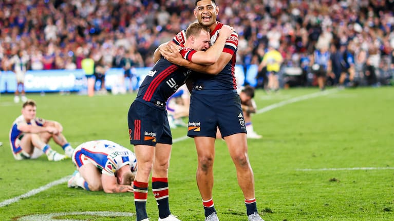 Daly Cherry-Evans of the Roosters and Daniel Tupou of the Roosters celebrate after winning the 2026 NRL grand final match between the Sydney Roosters and the Newcastle Knights at Accor Stadium in Sydney, Sunday, October 4, 2026
