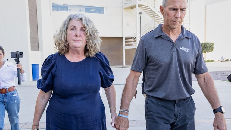 Debra and Martin Robinson, parents of Australian brothers Callum and Jake Robinson, leave the courthouse after the trial of the men accused of murdering the brothers.