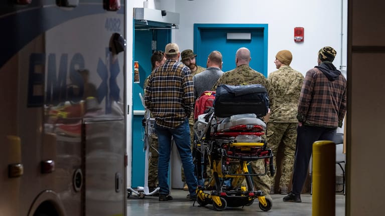 Emergency crews and military personnel are seen at the Wainwright Health Centre as injured military members are treated after a fire at Canadian Forces Base Wainwright, outside of Wainwright, Alberta.