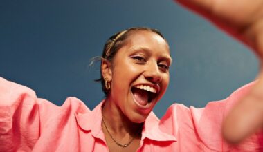 Close-up of happy person wearing pink