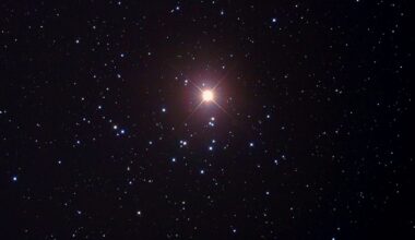 Mars passing across the Beehive Cluster in October 2011, imaged through a f/3.3 reflector. Credit: Pete Lawrence