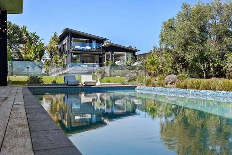 A waterfront property at 34 Harbour View Road, in Auckland's Point Chevalier, is expecting to sell for well above its $6.7m RV. Photo / Supplied