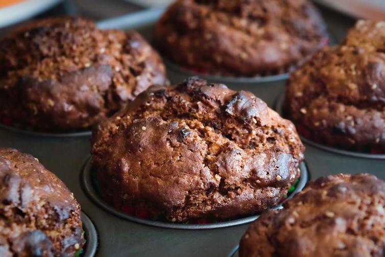 Muffins in baking tray.