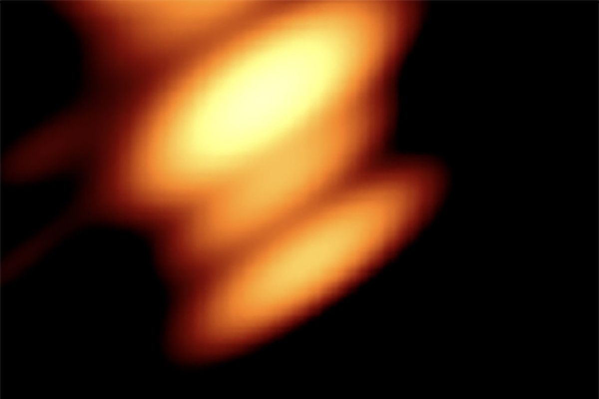 This is the first image of two black holes orbiting each other ever captured, in quasar OJ287. The image shows radio light glowing gas around the black holes. Credit: Valtonen, Mauri et al., The Astrophysical Journal, 2025