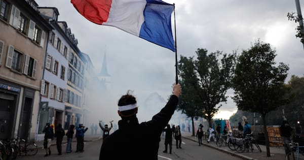 More than 400,000 protest across France as Paris clashes erupt