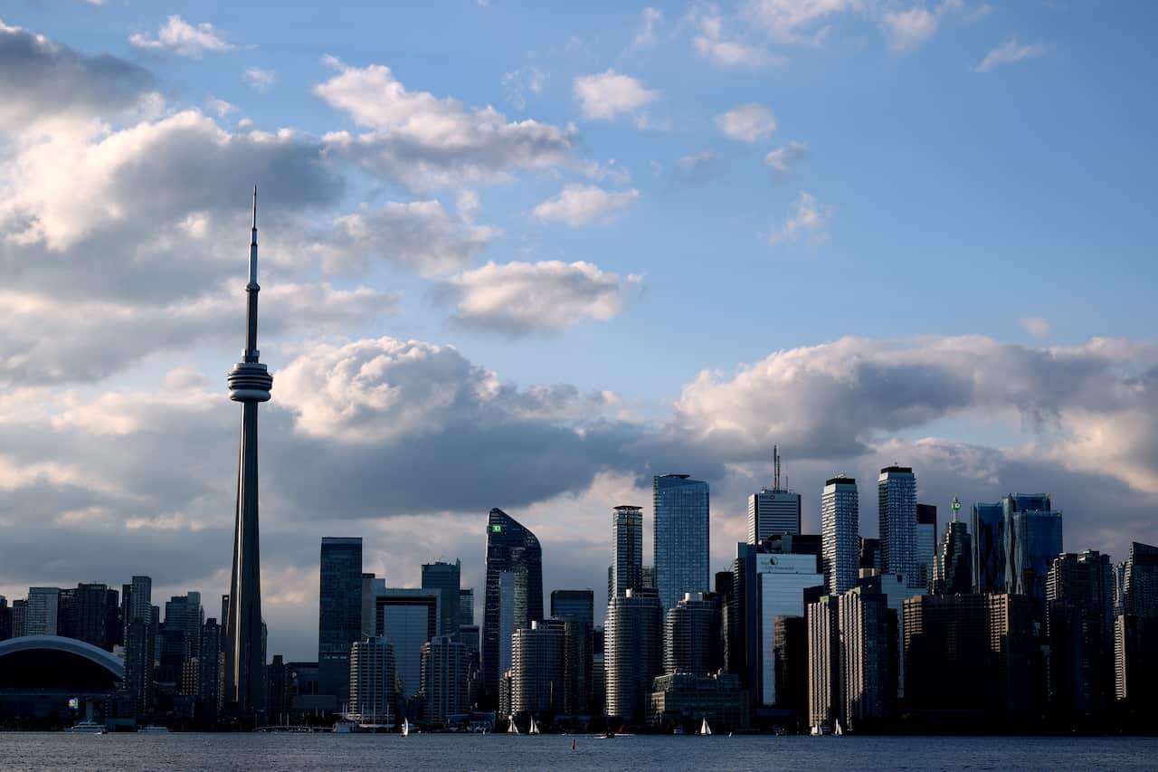 Toronto's skyline seen from across a lake.