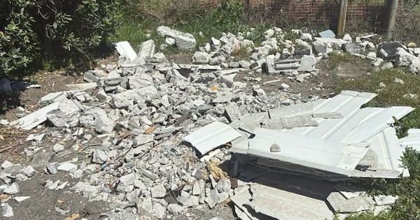 Asbestos dumped at abandoned camp – boulders put in as barrier