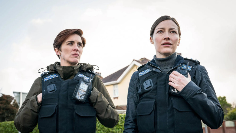 Kate Fleming (Vicky McClure) and Jo Davidson (Kelly Macdonald) standing next to each other on 
