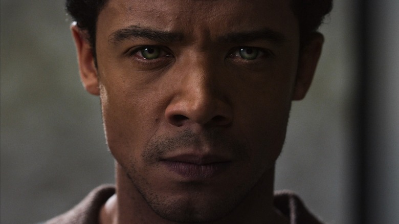 Close-up of Louis de Pointe du Lac staring at the camera