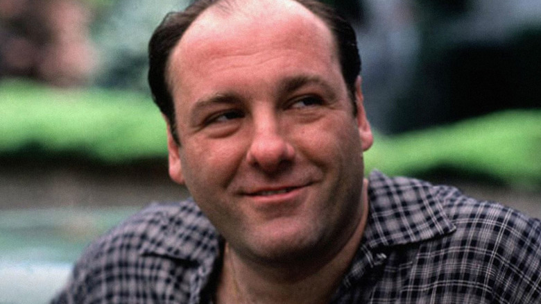 James Gandolfini as Tony Soprano, sitting outside in The Sopranos.
